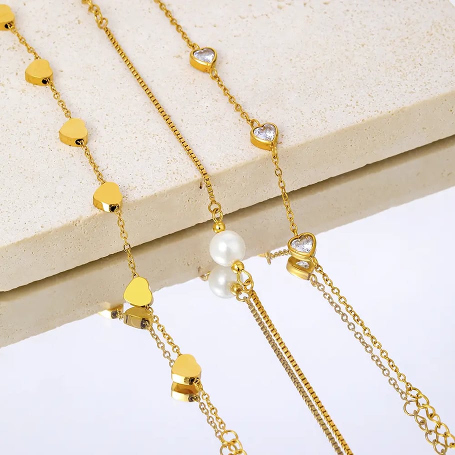 a simple gold-plated stainless steel peach heart zircon bracelet for women's daily wear
